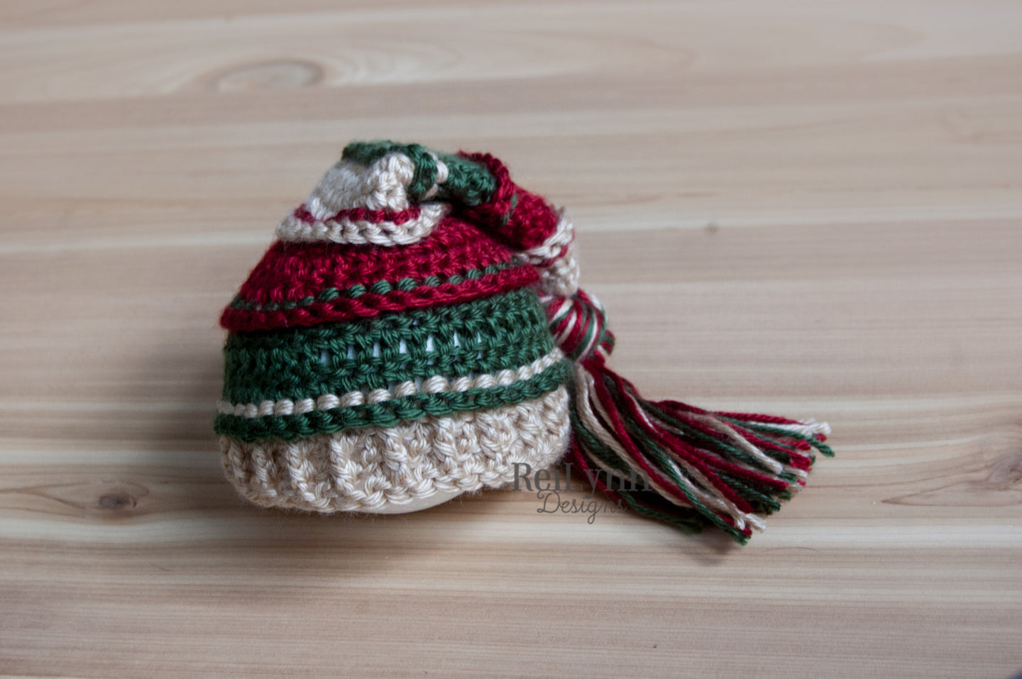 Bone, Deep Red, and Evergreen Tassel Hat
